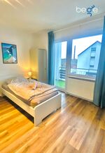 Schlafzimmer 2 mit zwei Einzelbetten, Sitzecke und Smart TV Schlafzimmer 2 mit zwei Einzelbetten, Sitzecke und Smart TV