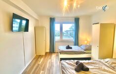 Schlafzimmer 1 mit zwei Einzelbetten, Sitzecke und Smart TV Schlafzimmer 1 mit zwei Einzelbetten, Sitzecke und Smart TV