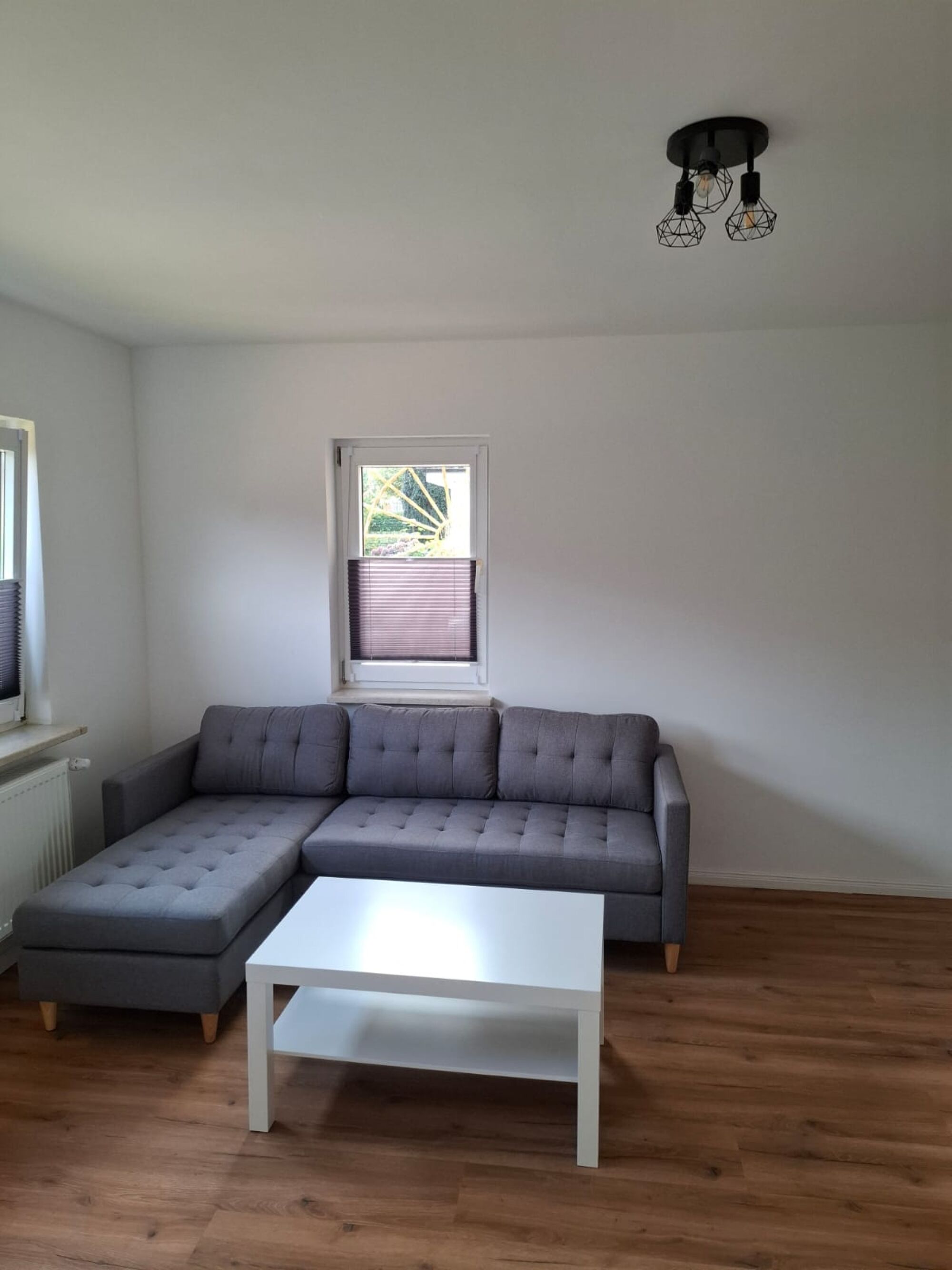Wohn/Schlafzimmer mit Sofa im EG Wohn/Schlafzimmer mit Sofa im EG