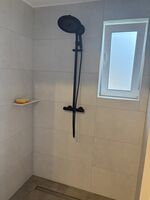 Wohnung 2: Duschbad mit bodengleicher Dusche Wohnung 2: Duschbad mit bodengleicher Dusche