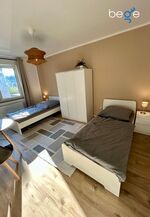 Schlafzimmer 3 mit zwei Einzelbetten, Sitzecke und Smart TV Schlafzimmer 3 mit zwei Einzelbetten, Sitzecke und Smart TV