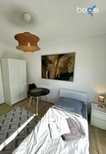 Schlafzimmer 2 mit zwei Einzelbetten, Sitzecke und Smart TV Schlafzimmer 2 mit zwei Einzelbetten, Sitzecke und Smart TV