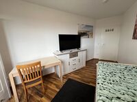 1‑Bett-Zimmer 1‑Bett-Zimmer