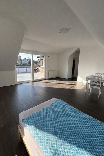 Wohnzimmer mit Einzelbett Wohnzimmer mit Einzelbett