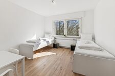 BudgetRoom Monteurwohnungen mit Küche, WLAN & Parkplatz Bild 1 BudgetRoom Monteurwohnungen mit Küche, WLAN & Parkplatz Bild 1