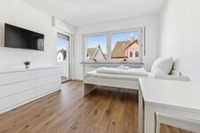 BudgetRoom Monteurwohnungen mit Küche, WLAN & Parkplatz Bild 7 BudgetRoom Monteurwohnungen mit Küche, WLAN & Parkplatz Bild 7