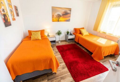 Orangenes Doppelzimmer Orangenes Doppelzimmer