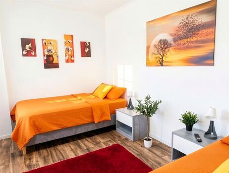 Orangenes Doppelzimmer Orangenes Doppelzimmer