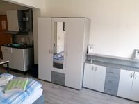 Geräumiges 1-Zimmer-Microapartment mit 3 Einzelbetten Bild 2 Geräumiges 1-Zimmer-Microapartment mit 3 Einzelbetten Bild 2