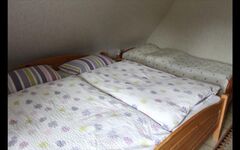 Schlafzimmer mit Doppelbett und 2. Bett Schlafzimmer mit Doppelbett und 2. Bett