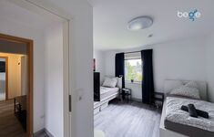 Schlafzimmer 3 mit zwei Einzelbetten, Sitzecke und Smart TV Schlafzimmer 3 mit zwei Einzelbetten, Sitzecke und Smart TV