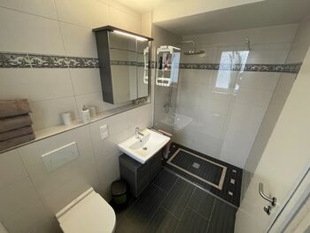 Bad mit angrenzender Küche Bad mit angrenzender Küche