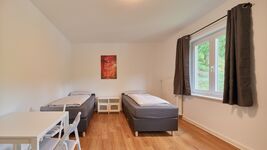 Pro Schlafzimmer gibt es zwei Einzelbetten. Pro Schlafzimmer gibt es zwei Einzelbetten.
