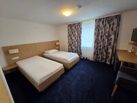 Hotel .rooms: Top-Lage D/CH-Grenze: Modernes Boarding House am Bahnhof Bild 2 Hotel .rooms: Top-Lage D/CH-Grenze: Modernes Boarding House am Bahnhof Bild 2