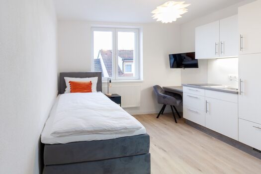 Beispiel eines Einzelapartments mit eigener Küchenzeile Beispiel eines Einzelapartments mit eigener Küchenzeile