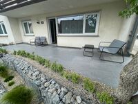 Terrasse mit Sitzgelegenheit und Zugang zum Wohnzimmer Terrasse mit Sitzgelegenheit und Zugang zum Wohnzimmer
