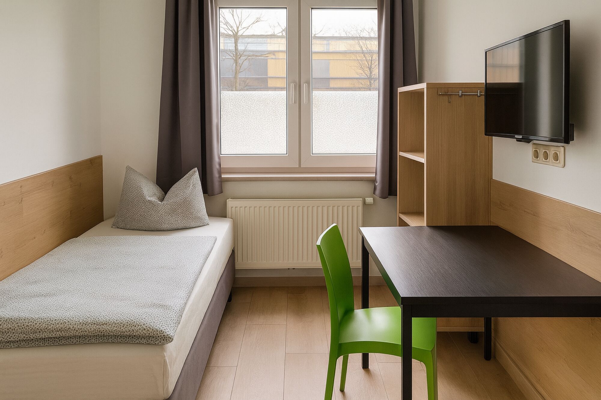 Einzelzimmer mit TV und Wi-Fi Einzelzimmer mit TV und Wi-Fi