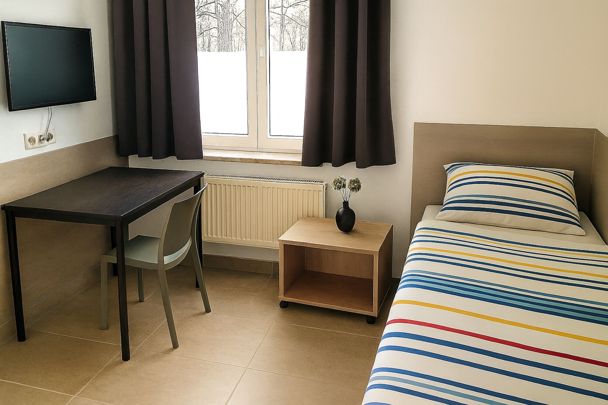 Einzelzimmer mit TV und Wi-Fi Einzelzimmer mit TV und Wi-Fi