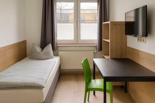 Einzelzimmer mit TV und Wi-Fi Einzelzimmer mit TV und Wi-Fi