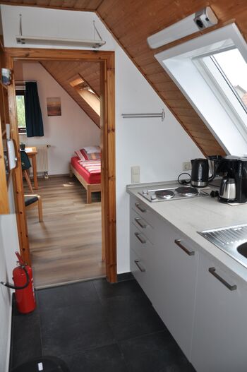 Schöne DG-Wohnung mit Gartensitzplatz Obrázok 3 Schöne DG-Wohnung mit Gartensitzplatz Obrázok 3
