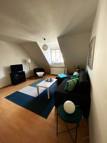 Wohnzimmer mit zusätzlicher Schlafmöglichkeit Wohnzimmer mit zusätzlicher Schlafmöglichkeit