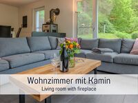 Wohnzimmer mit Kamin - Monteurzimmer in Alpirsbach Wohnzimmer mit Kamin - Monteurzimmer in Alpirsbach
