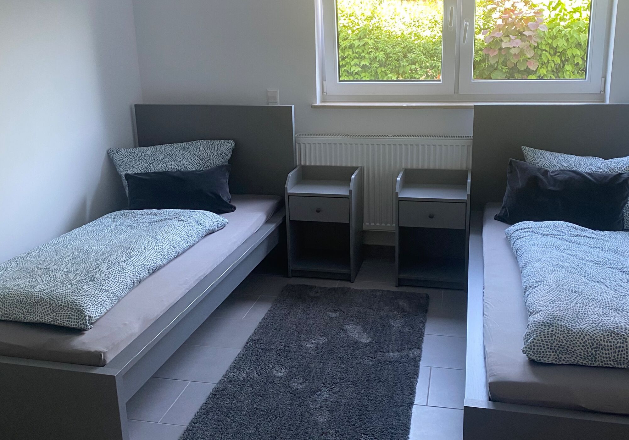 Schlafzimmer mit 2 Betten Schlafzimmer mit 2 Betten