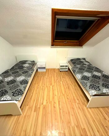 Schlafzimmer mit Einzelbetten Schlafzimmer mit Einzelbetten