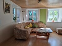 Wohnzimmer mit Kachelofen Wohnzimmer mit Kachelofen