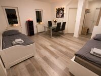 Wohnzimmer mit 2 Betten