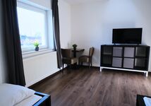 2-Zimmer Apartment mit Netflix & TV Bild 4