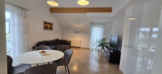 Seeblick - Suites: Wohnzimmer mit Schlafsofa