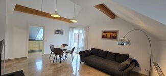 Seeblick - Suites: Wohnzimmer mit Schlafsofa