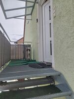 Hauseingang Appartement und DG