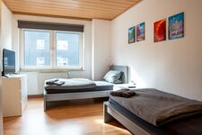 Happy Suites - moderne Wohnung, Einzelbetten, WiFi, Parken Bild 6