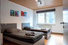 Happy Suites - moderne Wohnung, Einzelbetten, WiFi, Parken Bild 1