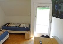 Schlafzimmer im EG mit Balkon/Terrasse große Ferienwohnung