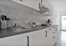 Apartments in the city center I private parking I kitchen Bild 16