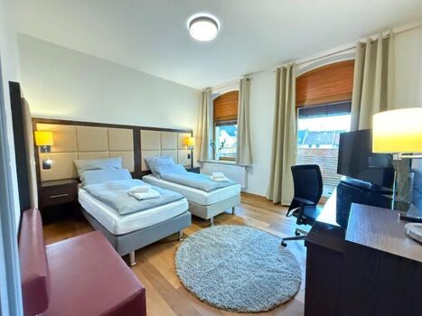 Moderne Apartments | Citynah | Free WiFi | Balkon + Terrasse Bild 1
