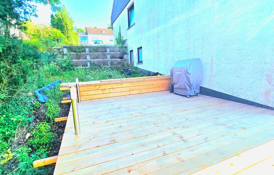 Enjoy the sun on the private wooden terrace. Perfect for a BBQ after a trip to Trier.