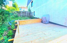 Enjoy the sun on the private wooden terrace. Perfect for a BBQ after a trip to Trier.
