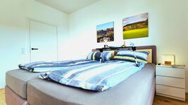 Relax and recharge your phone! King-size bed with smart lamp. Your holiday apartment in Trierweiler.