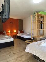 Einzelbetten und Schlafsofa