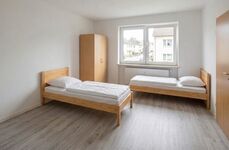Monteurunterkünfte in Nieder-Erlenbach – 24h Check-In Bild 1