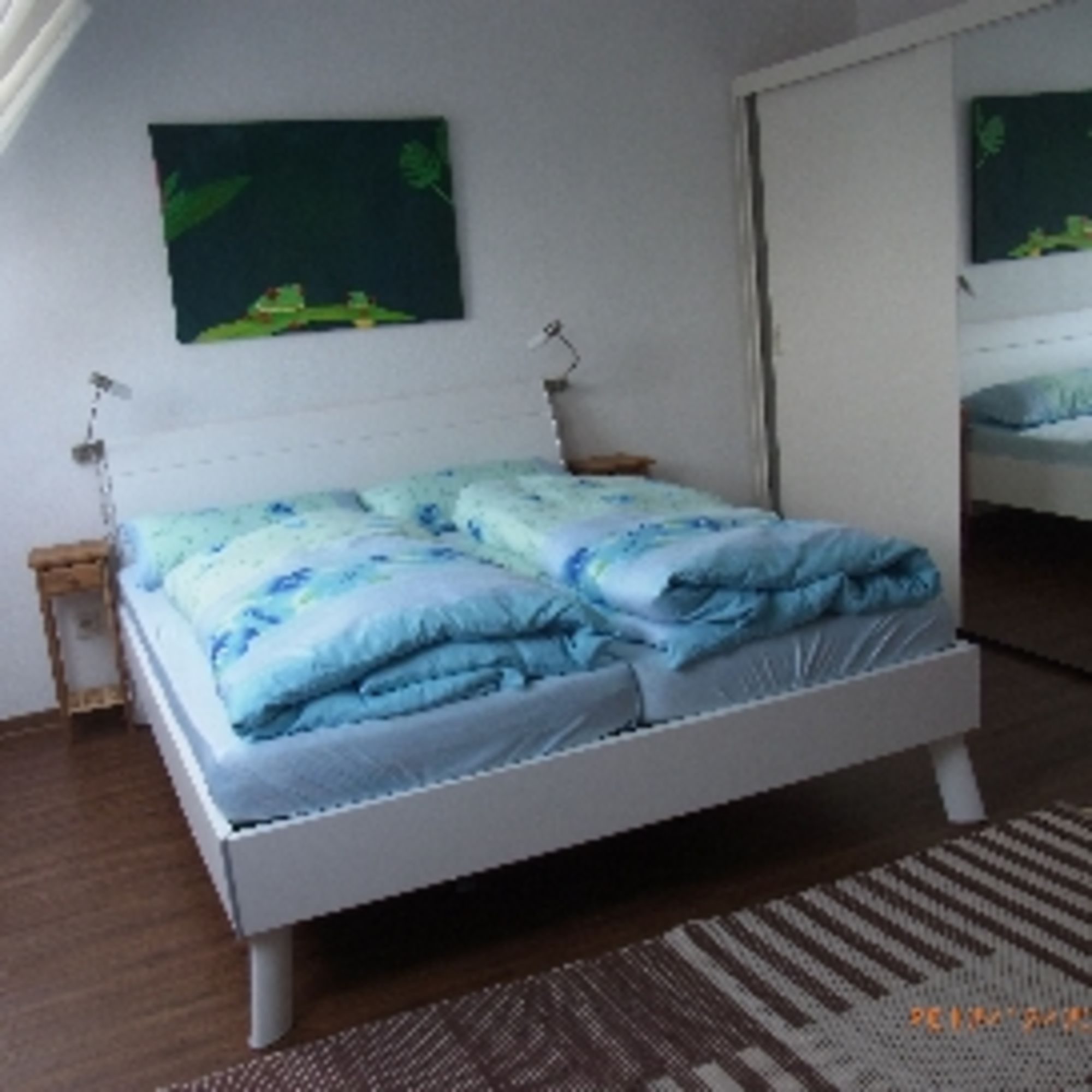 Schlafzimmer mit Doppelbett