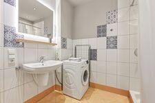 Badezimmer mit Waschmaschine