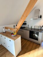 Der Kutscher · Schlössle Lodge am Rhein Bild 2