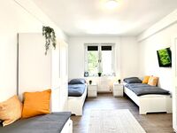 Monteurwohnung mit Balkon und Wohnzimmer Bild 11