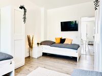 Monteurwohnung mit Balkon und Wohnzimmer Bild 7