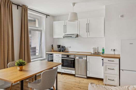 Erholsame Wohnung mit Balkon, Einbauküche und Stellplatz Bild 2